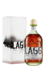 A bottle of LAGG Single Malt Corriecravie Edition 70cl with a light amber color stands next to its box, which displays an abstract design featuring the LAGG logo prominently in bold letters.