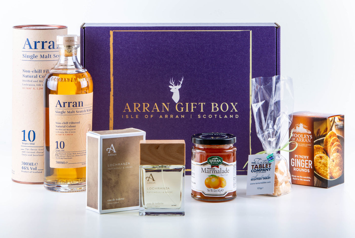 Experience the true essence of Scotland with the Deluxe Lochranza (10 Year Old Malt) Arran Gift Box, which includes a 10-year-old Arran single malt whisky, a Lochranza scented candle, delicious Arran marmalade, classic Scottish tablet, and cozy ginger biscuits—all made on the captivating Isle of Arran.