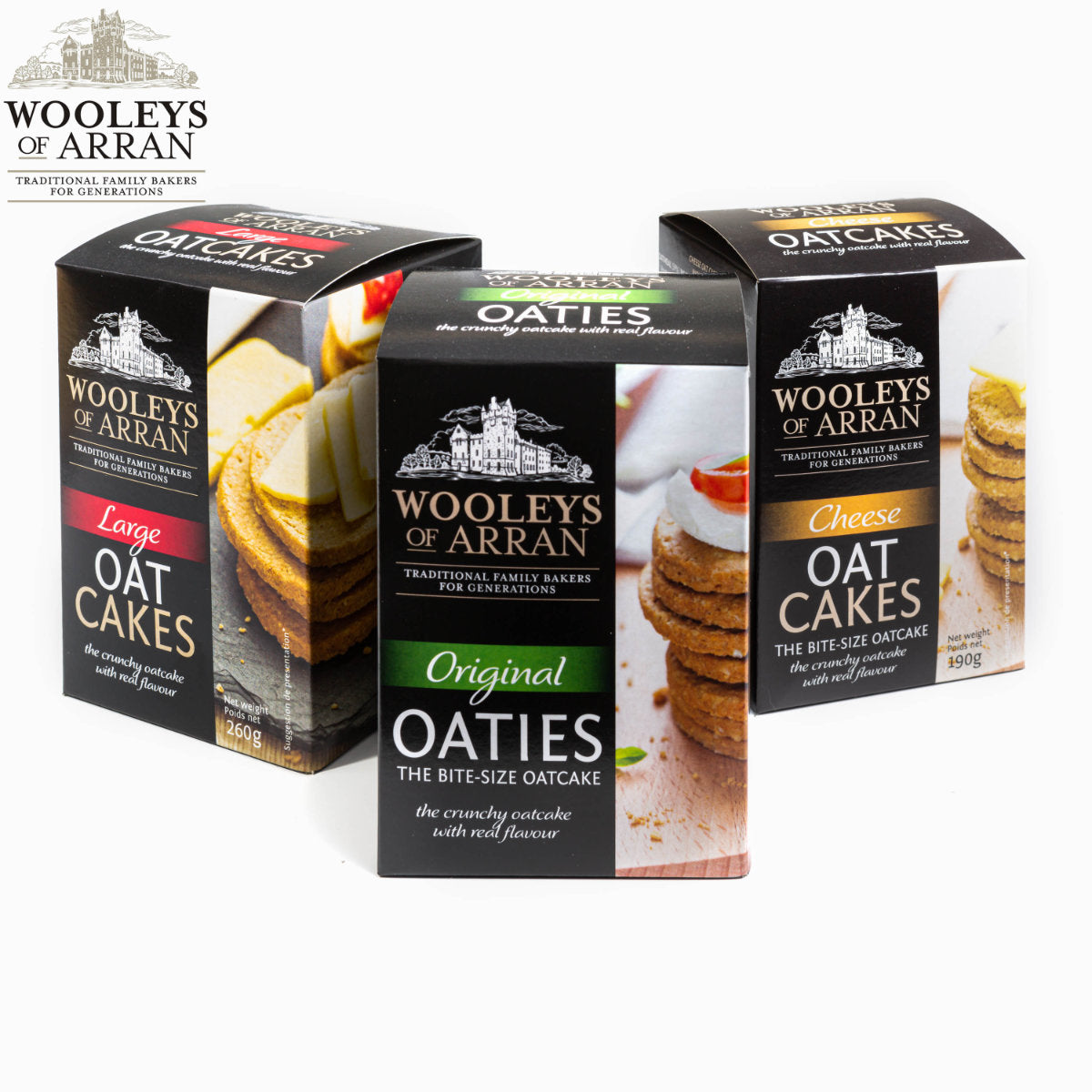 Three packages of Wooleys Oatcakes Mix Pack are displayed, featuring "Original Oaties," "Cheese Oat Cakes," and "Large Oat Cakes." Each package showcases images of stacked oat cakes topped with cheese and vegetables.